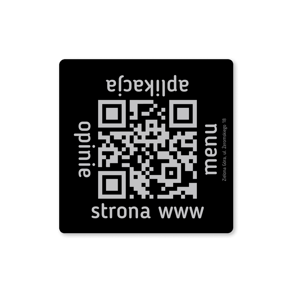 Kubek z grawerem laserowym. Grawer w kolorze czarnym, idealnie kontrastuje z szarym tłem.